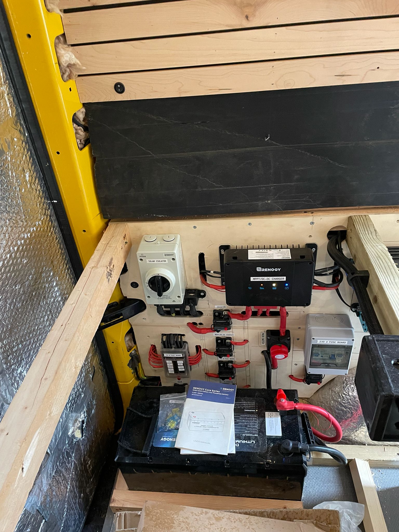 Full campervan off-grid electrical system with Renogy charger and battery