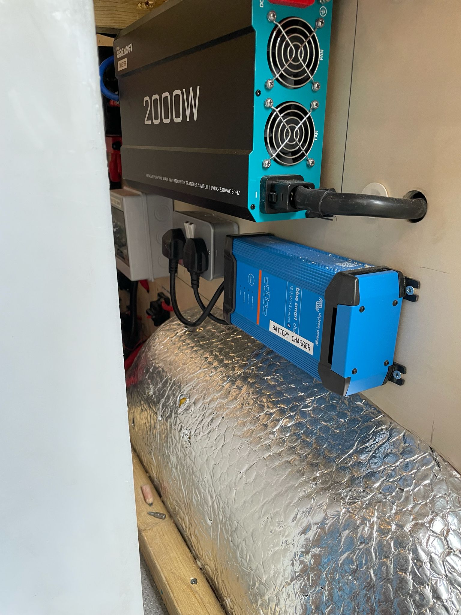 Renogy 2000W inverter and Victron Blue Smart charger in campervan